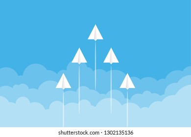 Paper airplanes flying from clouds on blue sky.Paper art style of business teamwork creative concept idea. Paper Planes Background.