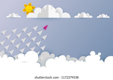 Paper airplanes in form of arrow shape flying from clouds on blue sky.Paper art style of business teamwork creative concept idea.Vector illustration