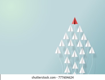 Paper airplanes in form of arrow shape flying on blue sky.Paper art style of business teamwork creative concept idea.Vector illustration