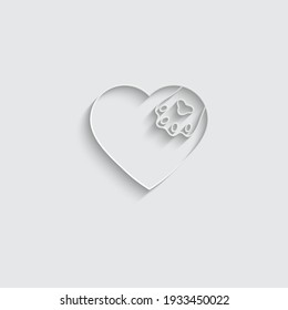 paper animal foot print icon in a heart 