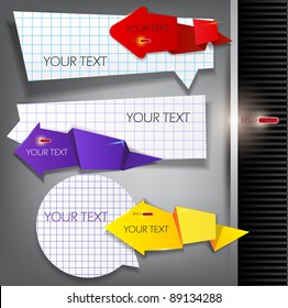 Paper arrows on a gray background with place for text