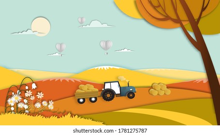 Paper art Autumn landscape in countryside at harvest farm with tractor and straw bales, Vector paper cut style of field landscape in fall season with hot balloon flying in the sky.