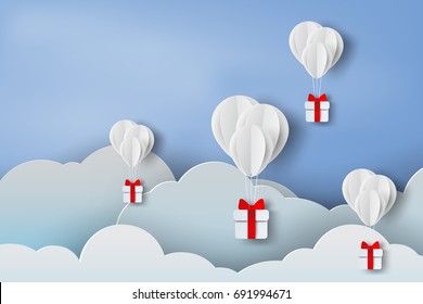 paper art of balloon white  floating and Gift Box on in the air blue sky background for Merry Christmas and Festival poster.Creative design paper craft and cut with Holiday season.vector.illustration