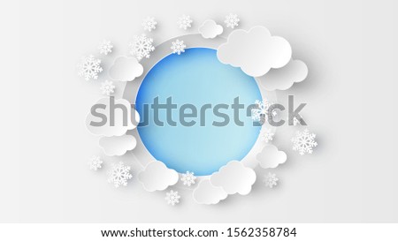 Paper art of circle frame for the winter decorated with snowflakes, clouds and place text space. paper cut and craft style. vector, illustration.
