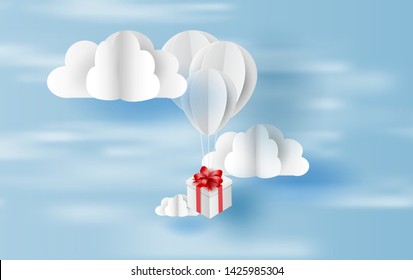 paper art and craft style of balloon white  floating and Gift Box on in the air blue sky.Your text space background vector.Festival decorations for card concept.Christmas,vector. illustration. EPS10