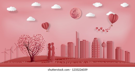 Paper art , cut and Carving design of Lover in the pink park with hot air balloon in sky as romantic , lovely  and craft style concept. vector illustration.