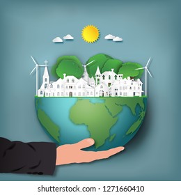 Paper art , cut and craft style of Businessman hold Modern houses and green trees on hemisphere green world as business, nature, eco and love earth day concept. vector illustration.