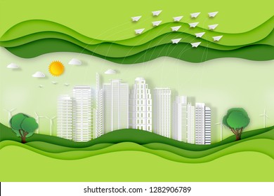 Paper art , cut and craft style of green eco urban city with airplane flying from building and nature cityscape background as Ecology design and environment conservation concept. Vector illustration