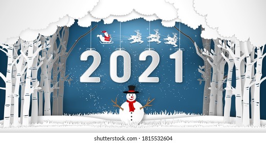 Paper art, cut and digital craft style of Santa Claus on Sleigh, Reindeer and snowman in winter season with trees , forest and snow as Merry Christmas and Happy New Year 2021 concept.