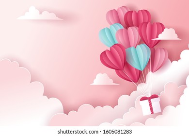 Paper art and digital craft style. Valentine's, Mother's, Anniversary day and Birthday greeting card design. Balloon in a heart shape floating and gift Box on cyan sky background, eps 10 vector.