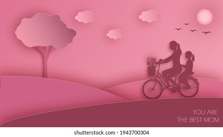 Paper art and kraft style greeting card for Happy Mother's Day. Mom and daughter ride a bike with a bouquet of meadow flowers on a cloudy sky pink background. Vector illustration.