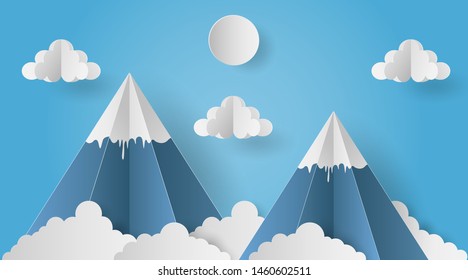 Paper art of mountain with  sun and cloud on blue backgrond
