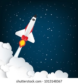 Paper art of space shuttle launch to the sky. Night sky, shining stars, fluffy clouds. Rocket launch. Start up business concept and exploration idea