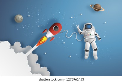 Paper art style of astronaut in outer space on mission, showing victory hand sign, flat-style vector illustration.