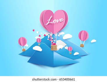 Paper art style Heart shape balloons flying with cloud over mountain. Love concept. Valentines day background