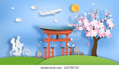 Paper art style of landscape in Japan with tourists riding on a bike, Japan landmark and tourist attractions, flat-style vector illustration.
