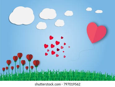Paper art style on valentine concept. Vector illustration. Flowers on the field wih heart shape ballon.