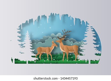 Paper art style of a pair of reindeer walks through a forest in the beginning of winter, flat-style vector illustration.