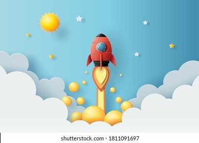 Paper art style of rocket flying in space, start up concept, design banner template, flat-style vector illustration.