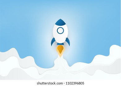 Paper art style. Rocket launch on clouds and blue sky. Business startup