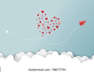 Paper art style of valentine's day greeting card and love concept.Red airplanes flying look like heart shape on clouds and blue sky.Vector illustration.
