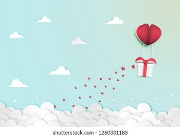 Paper art of valentine day festival with gift box in paper balloon heart shape on the blue sky background vector
