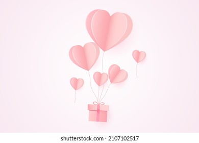 Paper art of Valentine's day festival with heart shaped balloons paper and gift box.