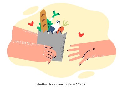 Paper bag with food in hands volunteer helping someone in need or delivering order from grocery supermarket. Concept food sharing and coupons to avoid hunger and charitable initiatives to help poor