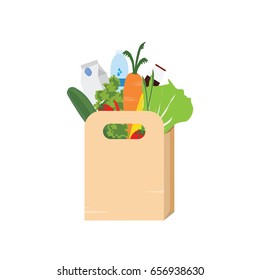Paper bag full of grocery isolated on white background.