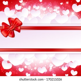 Paper banner with bow and ribbons on the glowing background with paper hearts