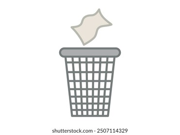 Papel tirado en un cubo de basura gris