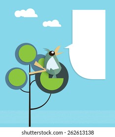 Paper bird perched on tree with speech bubble for your text.Blank space for design