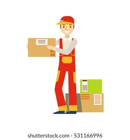 Paper Box Packages Piled Up In Warehouse With A Delivery Company Worker Shipping The Orders