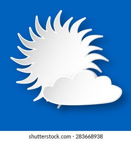 Paper bright shining sun and a cloud on the blue sky.