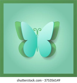 Paper butterfly on a green background