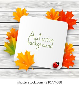 Paper card with autumn leaves