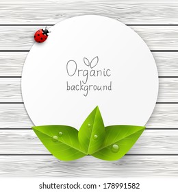 Paper card with green leaves