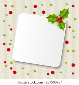 Paper card on knitted background
