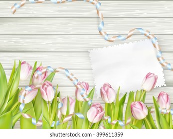 Paper card with tulips on wooden background. EPS 10 vector file included