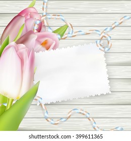 Paper card with tulips on wooden background. EPS 10 vector file included
