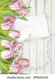 Paper card with tulips on wooden background. EPS 10 vector file included