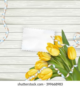 Paper card with tulips on wooden background. EPS 10 vector file included