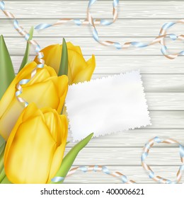 Paper card with tulips on wooden background. EPS 10 vector file included