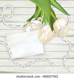 Paper card with tulips on wooden background. EPS 10 vector file included