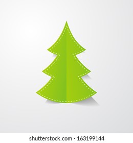 a paper Christmas tree on the white background