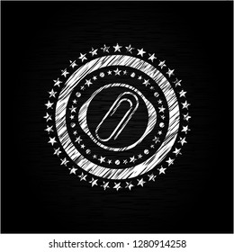 paper clip icon drawn on a blackboard