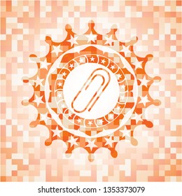 paper clip icon inside abstract emblem, orange mosaic background