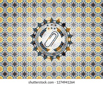 paper clip icon inside arabesque emblem. arabic decoration.