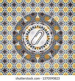 paper clip icon inside arabesque style emblem. arabic decoration.