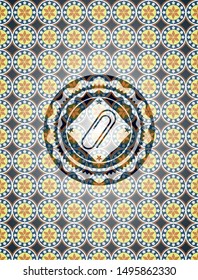 paper clip icon inside arabesque badge. arabic decoration.